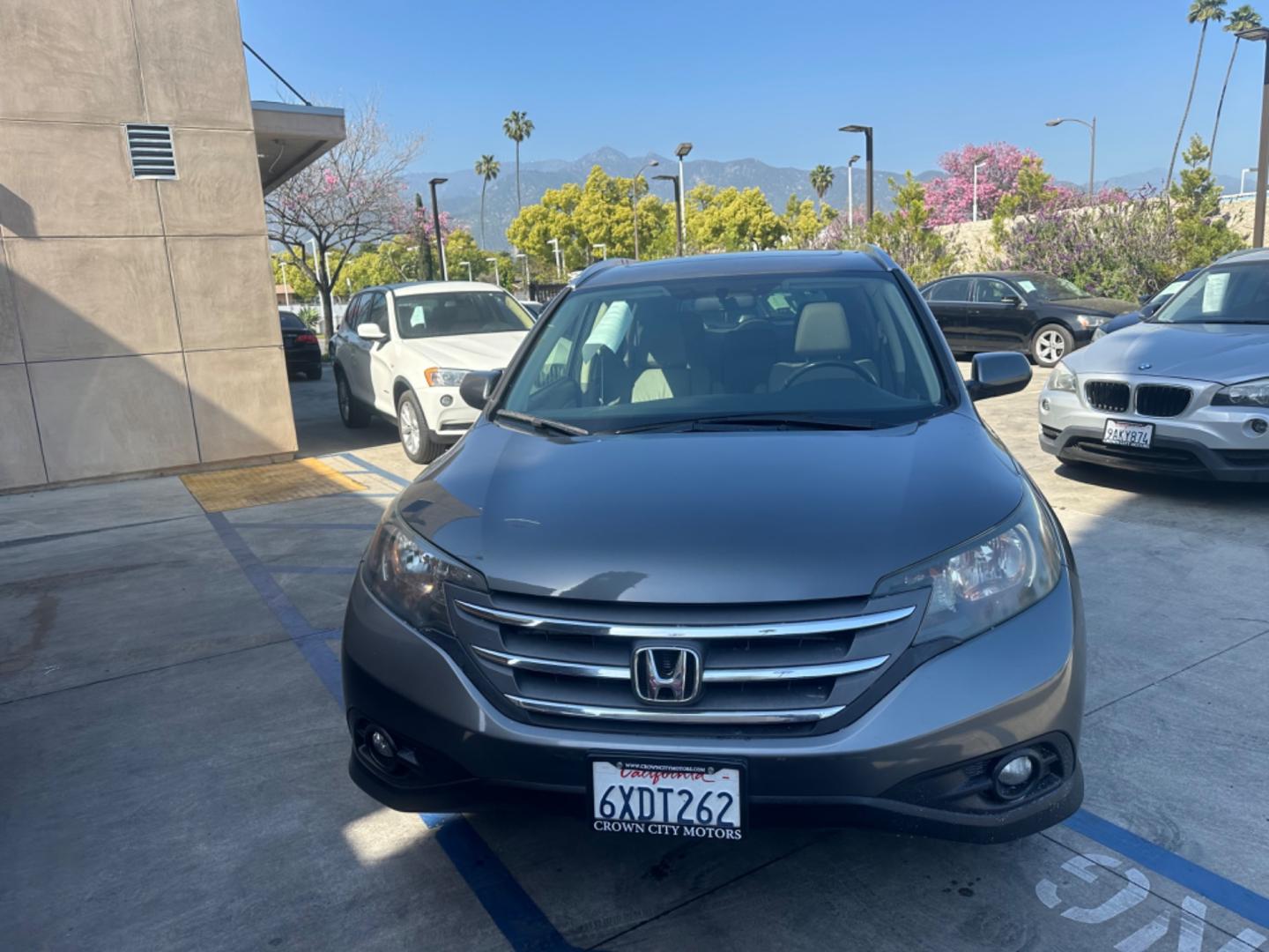 2012 BLUE /GRAY Honda CR-V leather (JHLRM3H70CC) with an 4 CYLINDER engine, Automatic transmission, located at 30 S. Berkeley Avenue, Pasadena, CA, 91107, (626) 248-7567, 34.145447, -118.109398 - Cars and Trucks!! Leather! Moon-roof! Well equipped! In the bustling streets of Pasadena, CA, and the vibrant neighborhoods of Altadena, Glendale, and the broader LA County, finding a reliable, stylish, and affordable vehicle can be a daunting task, especially if you're navigating the complexities - Photo#8